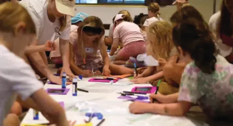 Children doing craft activities at Sunnyfest