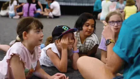 Children listening to a story at Sunnyfest